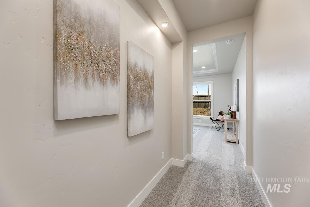 992 East Crescendo Street Meridian, ID 83642 - Photo 21 of 38 Hall with light colored carpet and recessed lighting