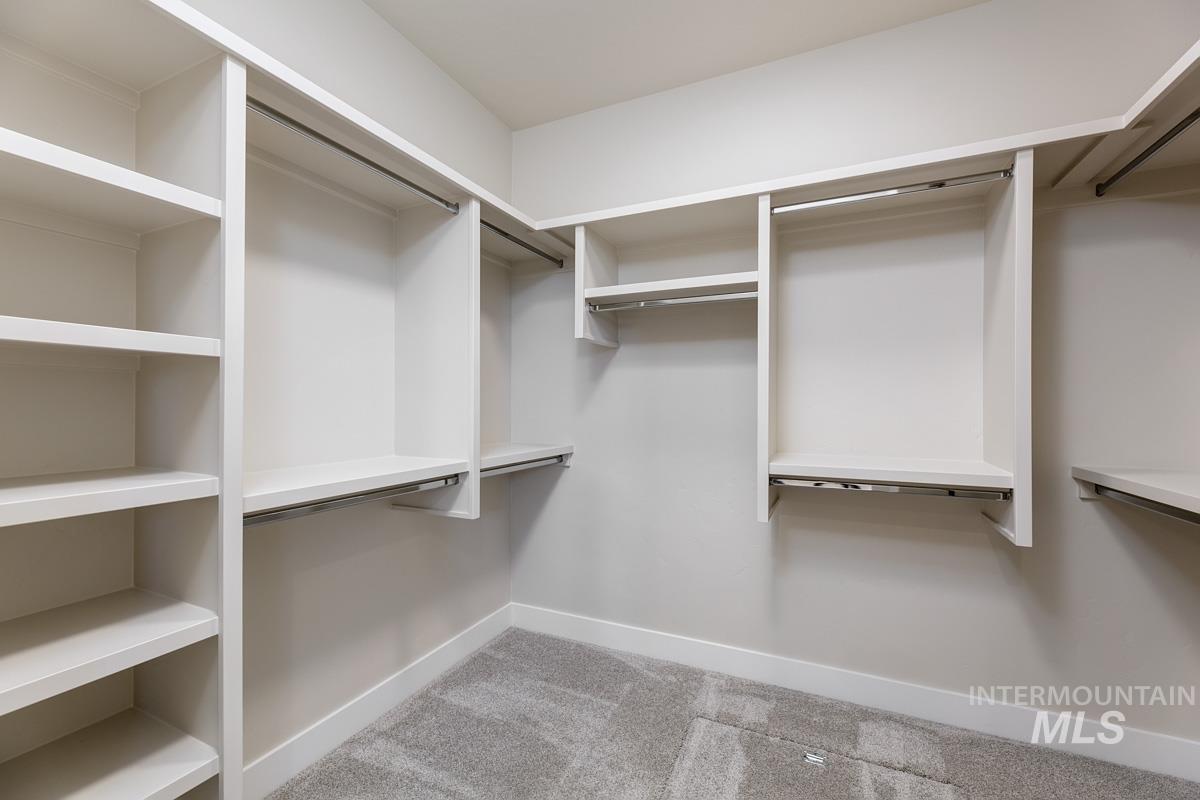 992 East Crescendo Street Meridian, ID 83642 - Photo 28 of 38 Walk in closet with light colored carpet