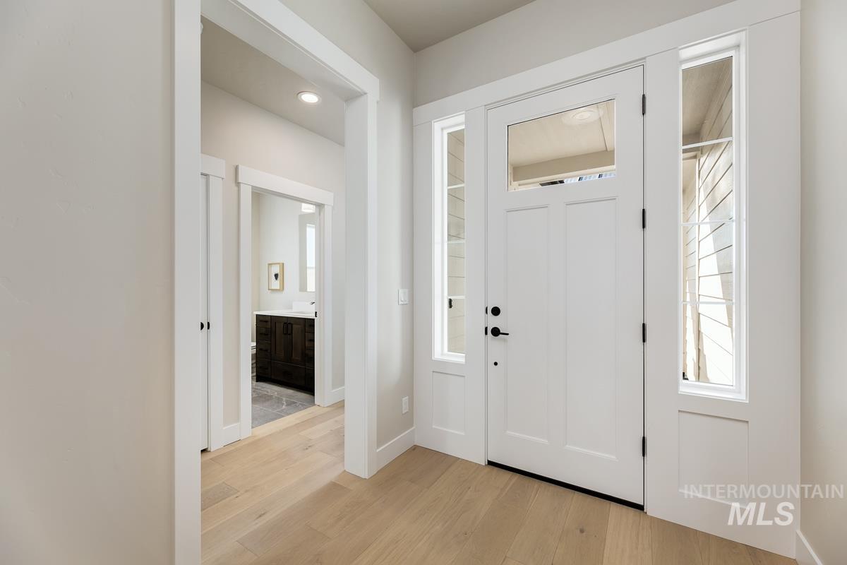 992 East Crescendo Street Meridian, ID 83642 - Photo 4 of 38 Foyer entrance featuring light wood-type flooring and recessed lighting