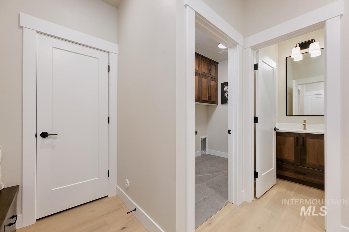 992 East Crescendo Street Meridian, ID 83642 - Photo 6 of 38 Hallway with light wood-type flooring and baseboards