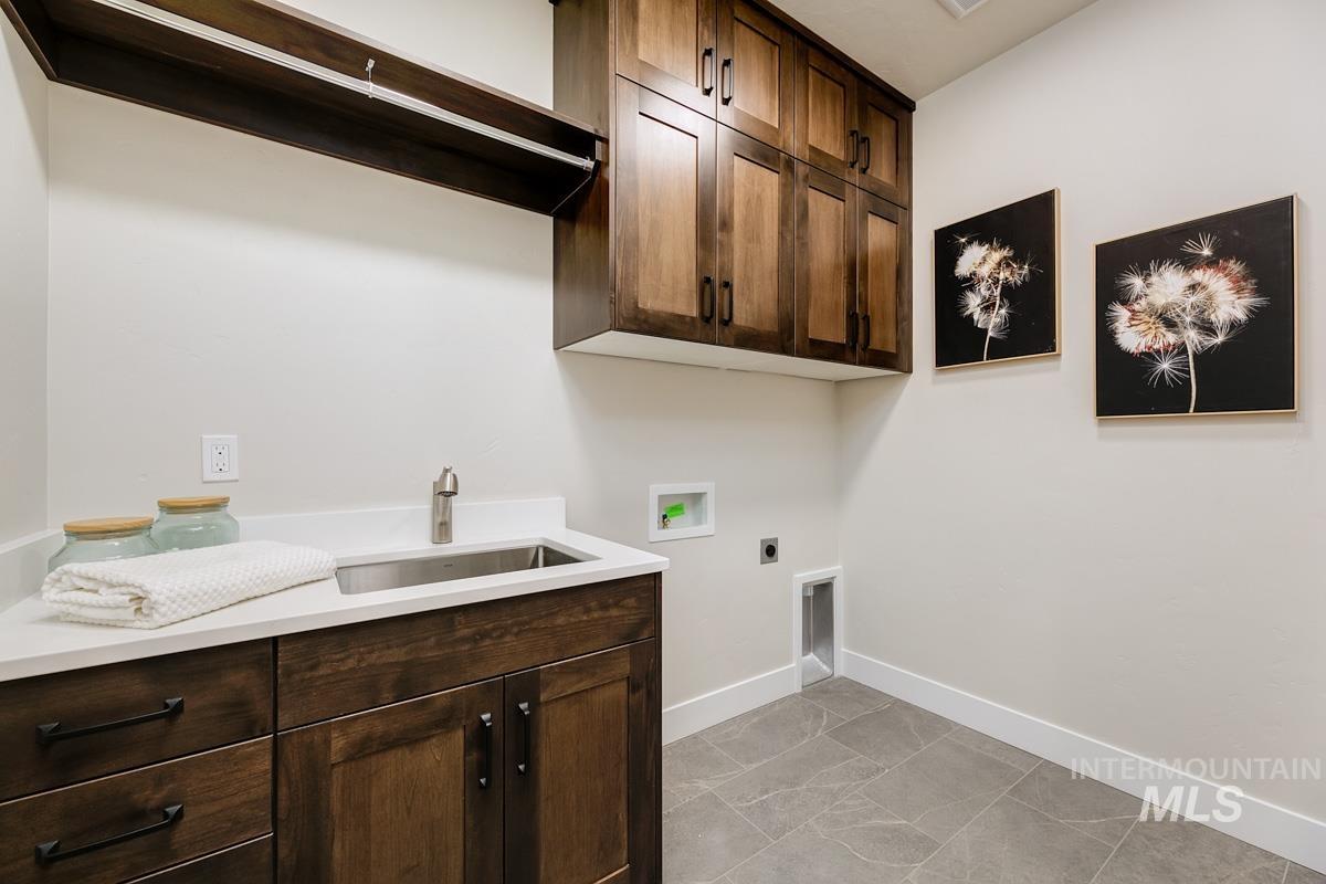992 East Crescendo Street Meridian, ID 83642 - Photo 10 of 38 Laundry area featuring cabinet space, electric dryer hookup, and hookup for a washing machine