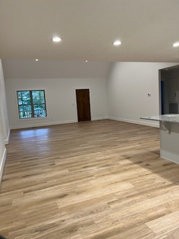 150 Hickory Ridge Lane Hartsville, TN 37074 - Photo 8 of 20 a view of an empty room with wooden floor and a window