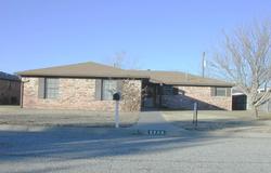 5706 Leigh Avenue Amarillo, TX 79110 - Photo 1 of 1 a view of a swimming pool with a yard