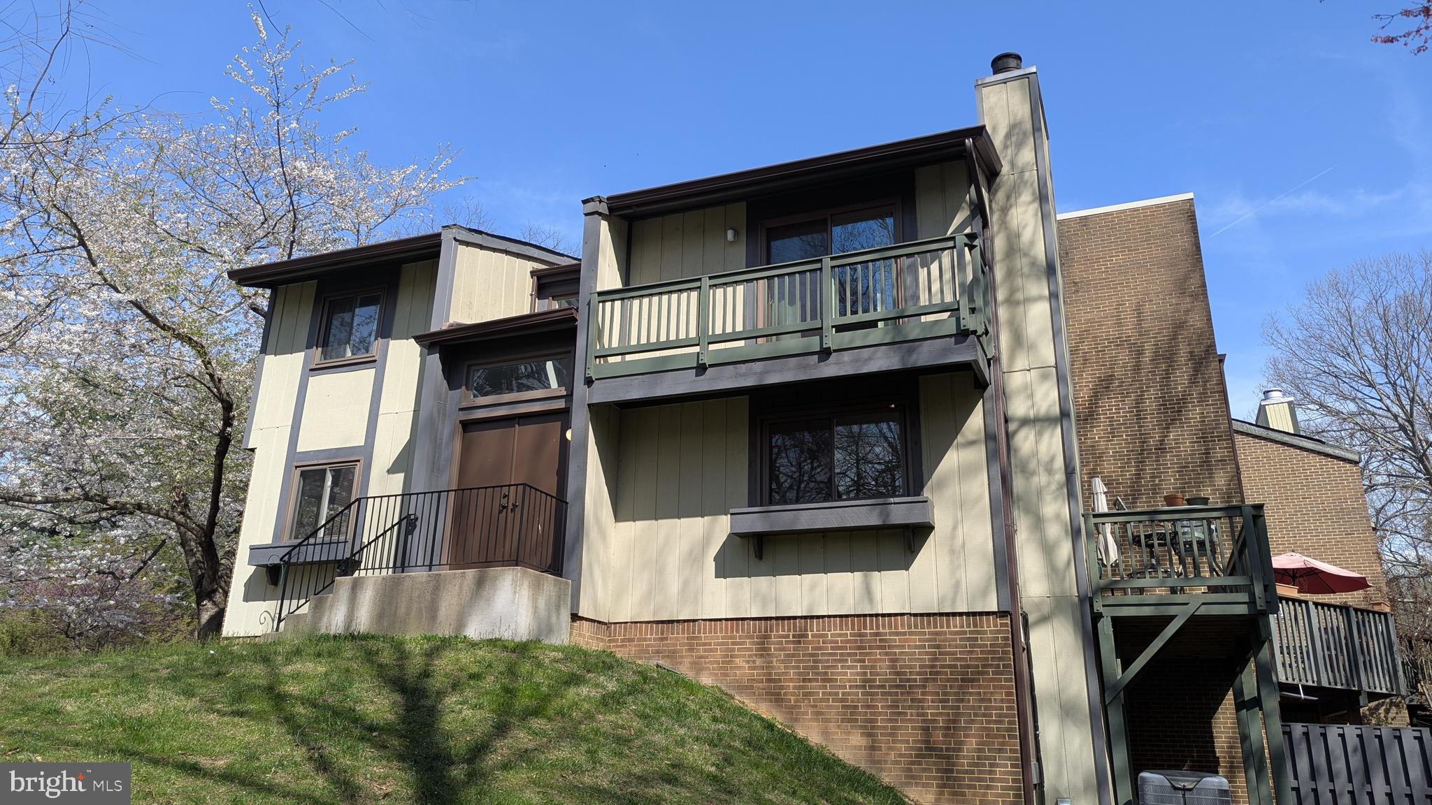 a front view of a house with a balcony