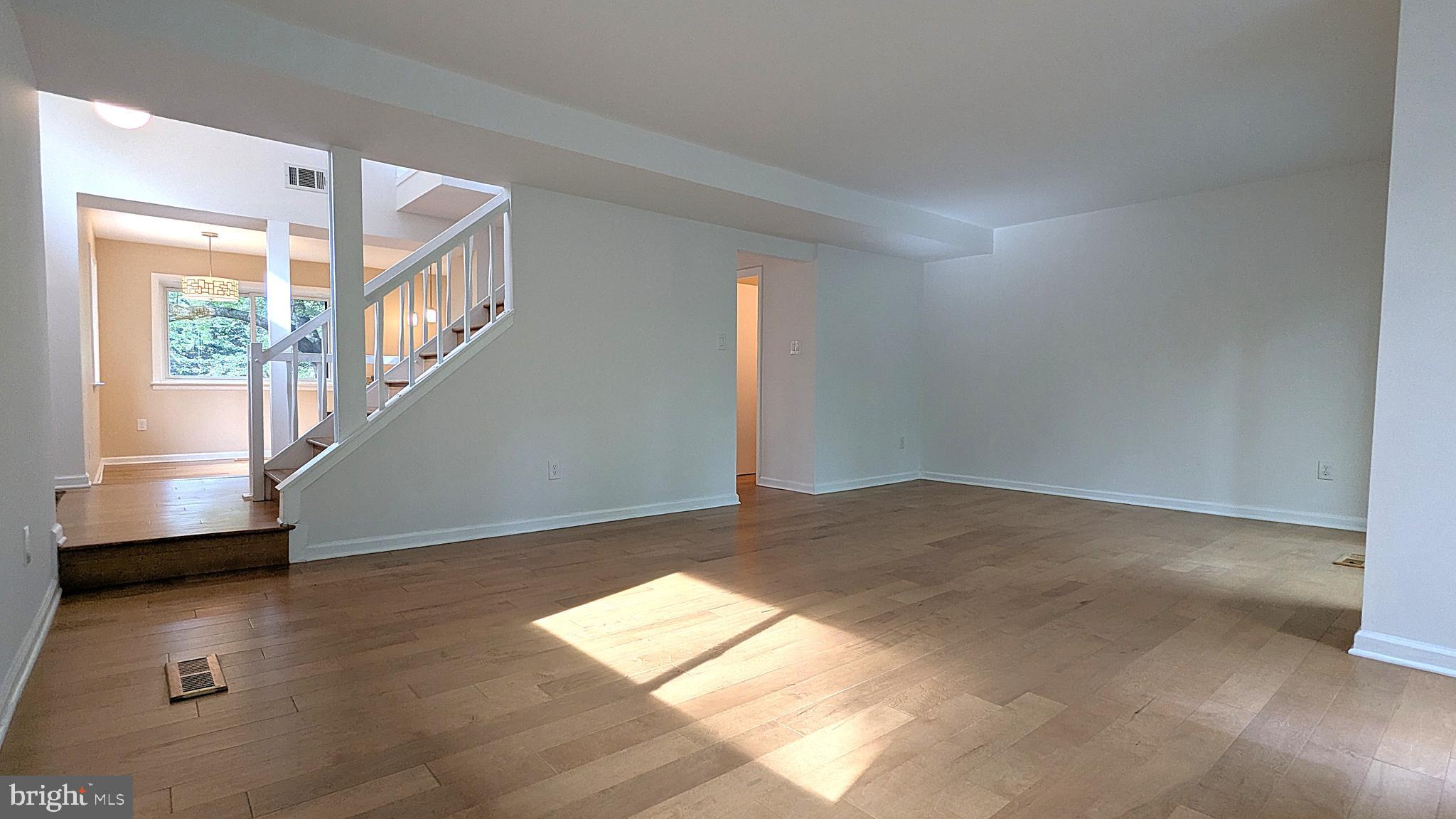 2200 Glencourse Lane Reston, VA 20191 - Photo 23 of 66 a view of entryway and hall with wooden floor