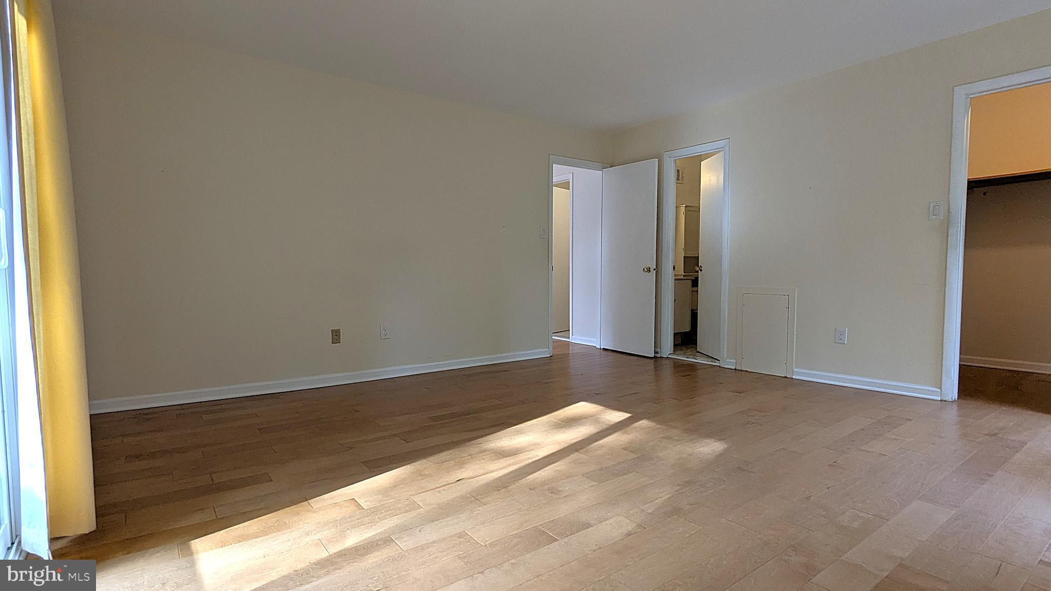 2200 Glencourse Lane Reston, VA 20191 - Photo 30 of 66 a view of an empty room with wooden floor