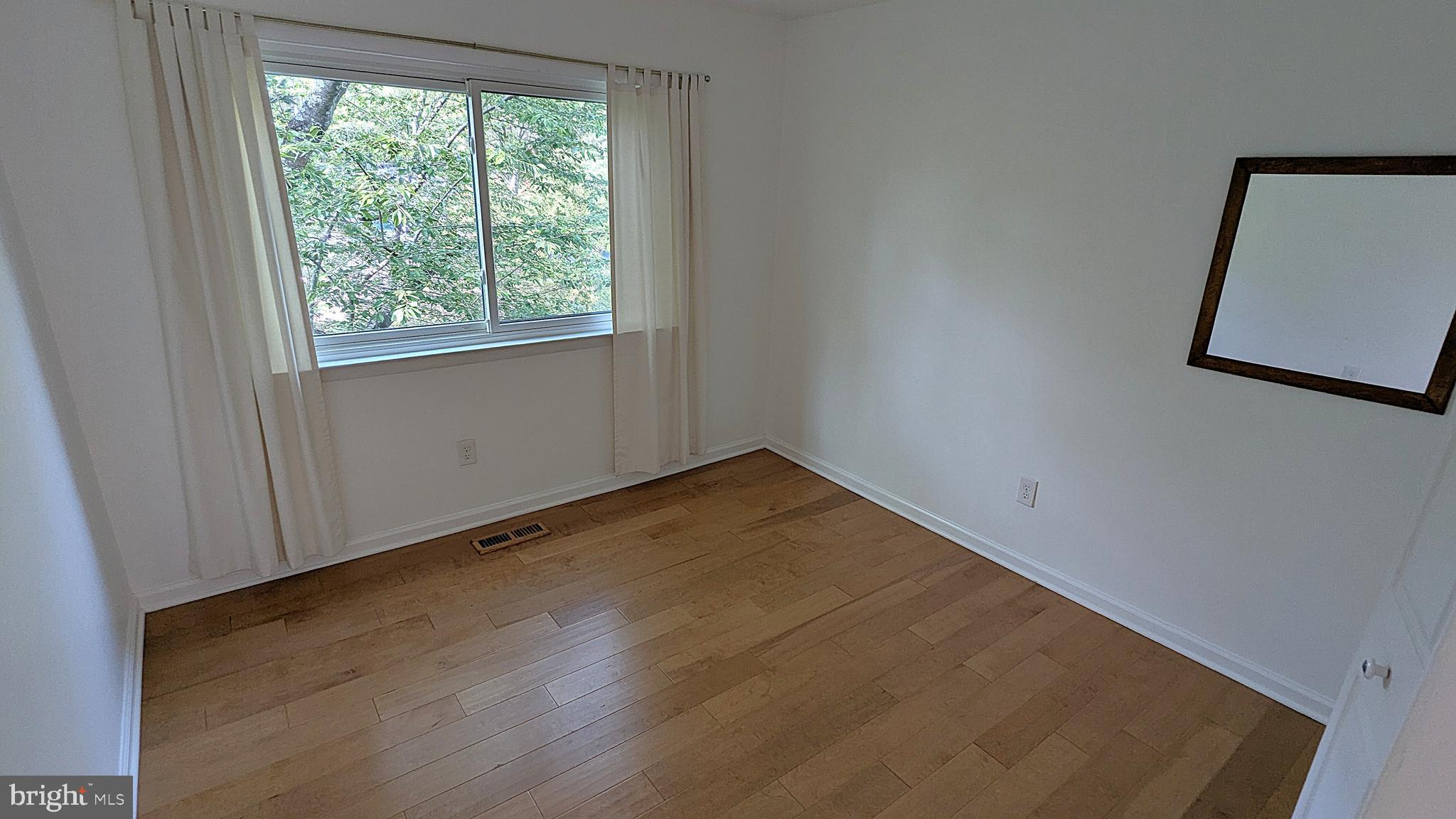 2200 Glencourse Lane Reston, VA 20191 - Photo 36 of 66 a view of a room that has a window in it
