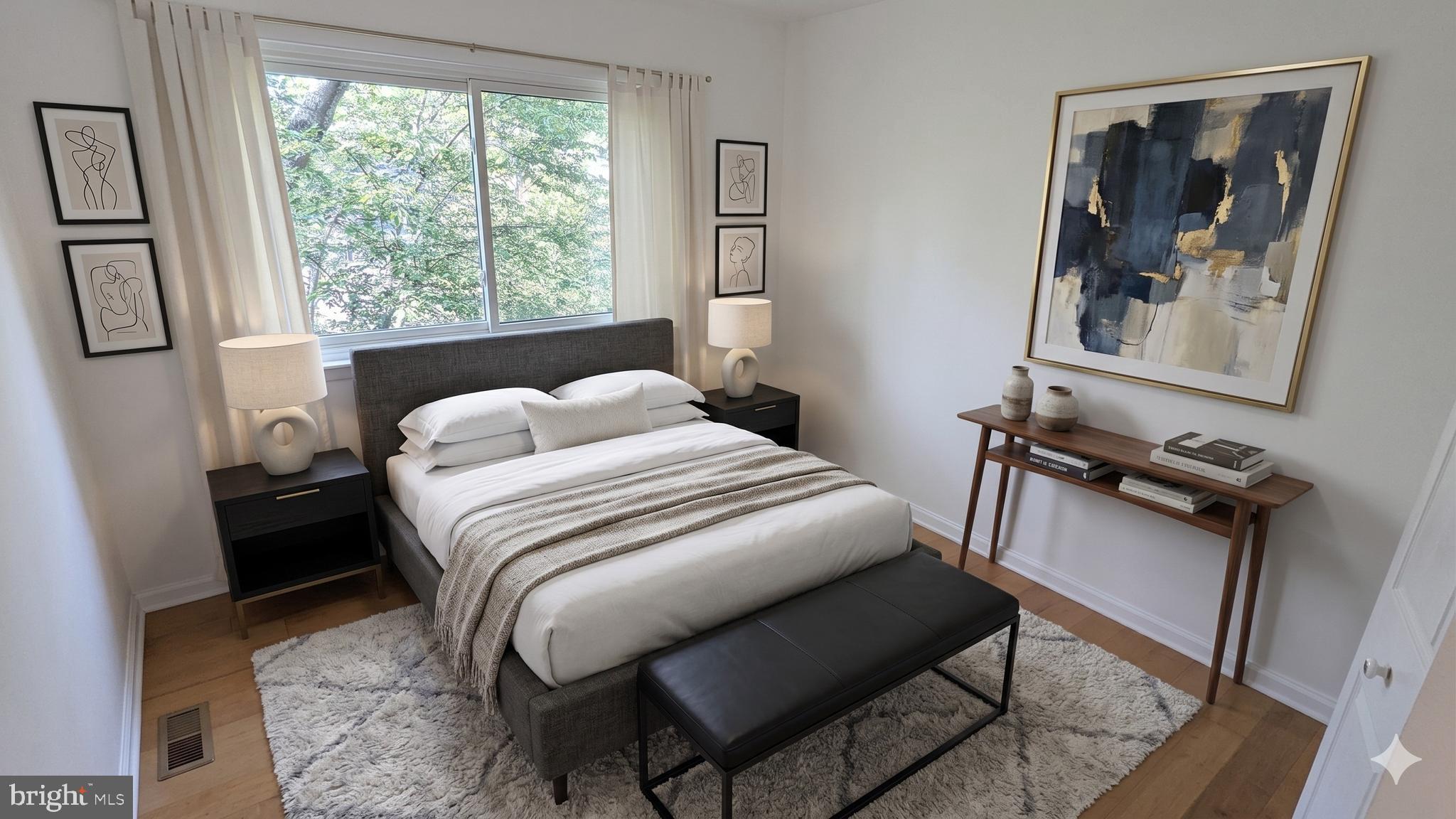 2200 Glencourse Lane Reston, VA 20191 - Photo 37 of 66 a bedroom with a bed and wooden floor