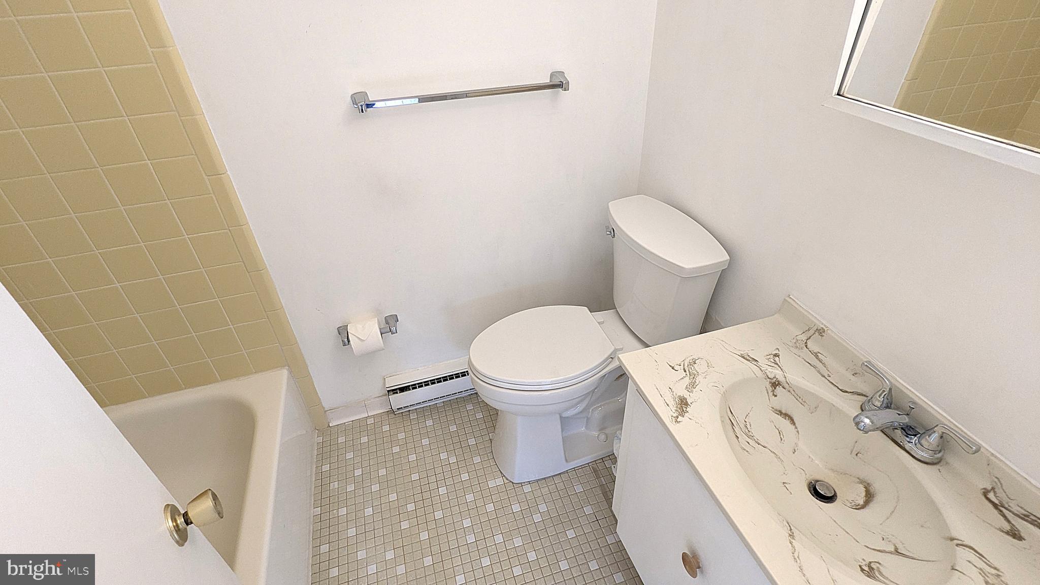 2200 Glencourse Lane Reston, VA 20191 - Photo 39 of 66 a bathroom with a toilet and a shower