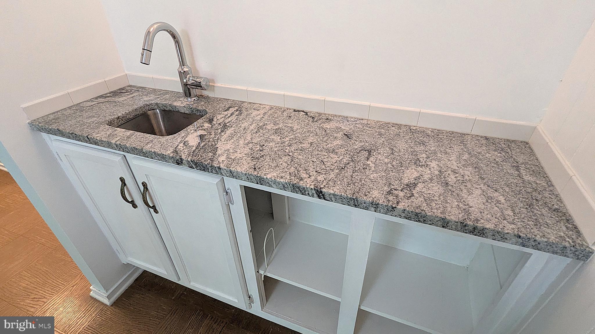 2200 Glencourse Lane Reston, VA 20191 - Photo 53 of 66 a close view of sink and tap