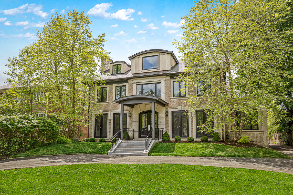 234 Sheridan Road Kenilworth, IL 60043 - Photo 1 of 41 a front view of a house with a yard
