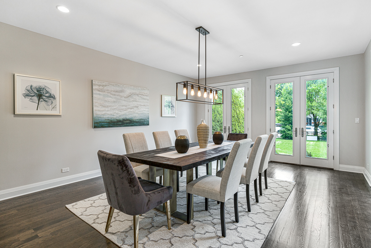234 Sheridan Road Kenilworth, IL 60043 - Photo 11 of 41 a view of a dining room with furniture window and wooden floor