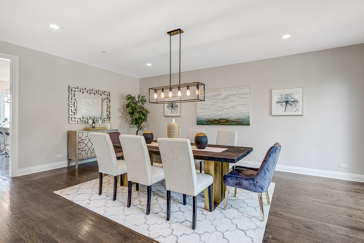 234 Sheridan Road Kenilworth, IL 60043 - Photo 12 of 41 a view of a dining room with furniture window and wooden floor