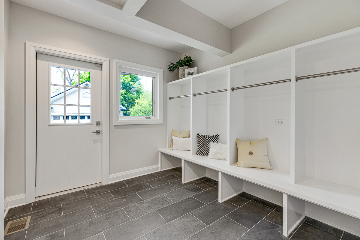 234 Sheridan Road Kenilworth, IL 60043 - Photo 21 of 41 a white room with a window and wooden walls