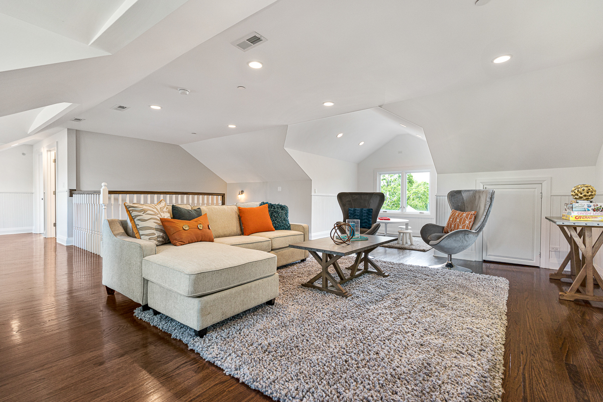 234 Sheridan Road Kenilworth, IL 60043 - Photo 32 of 41 a living room with furniture and a couch