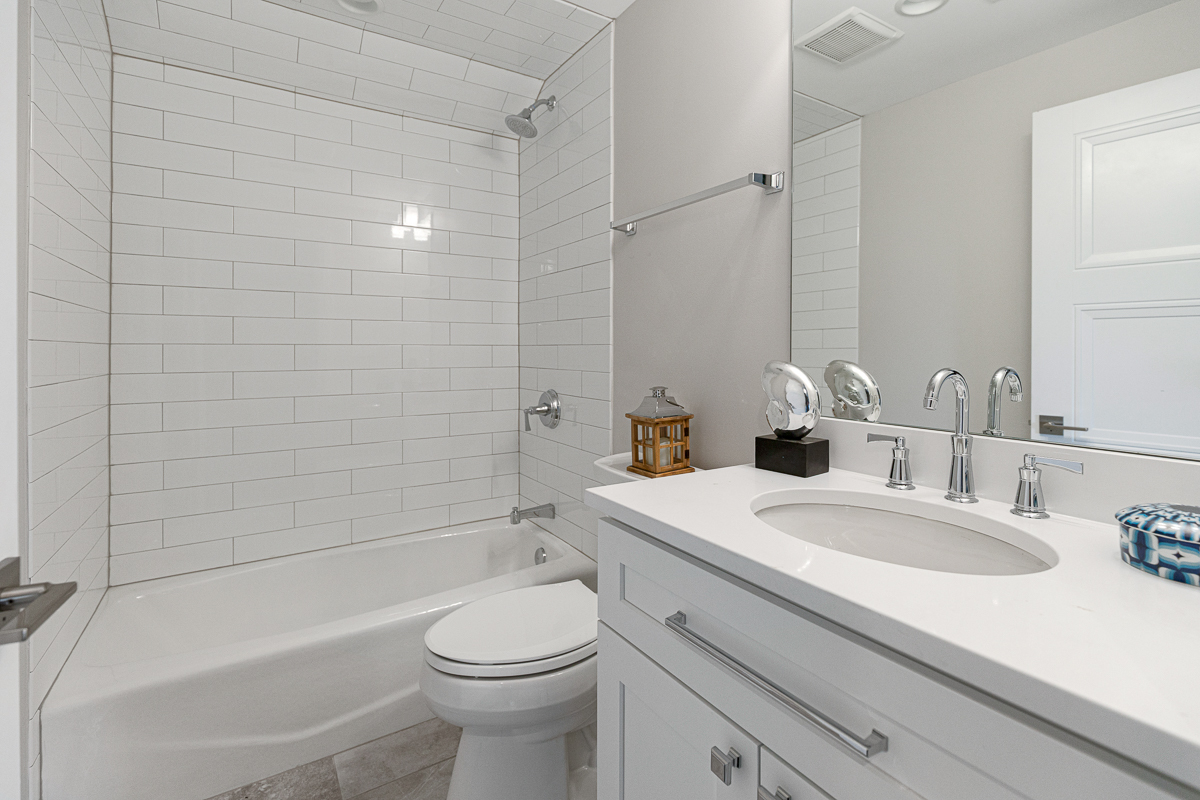 234 Sheridan Road Kenilworth, IL 60043 - Photo 37 of 41 a bathroom with a sink a toilet and shower