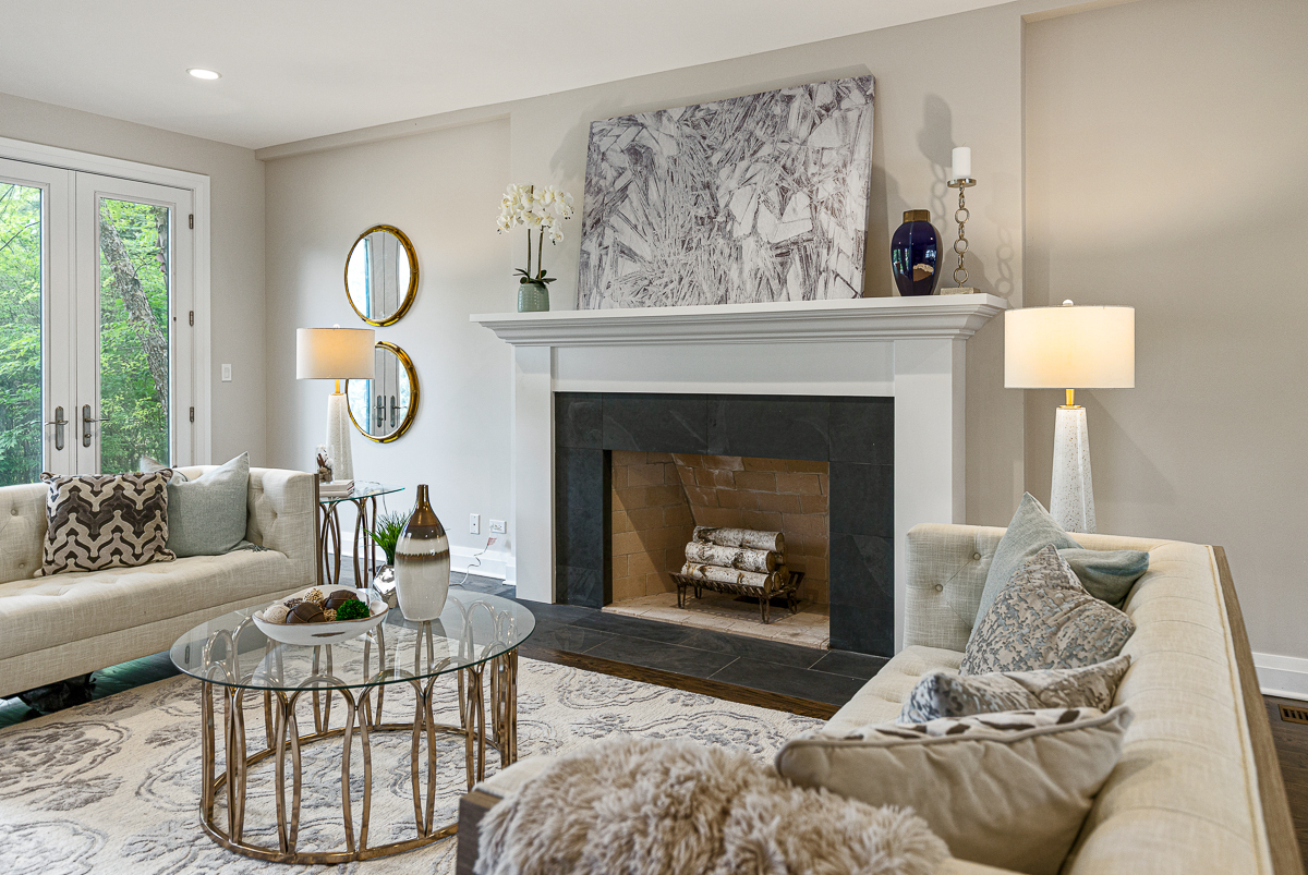 234 Sheridan Road Kenilworth, IL 60043 - Photo 10 of 41 a living room with furniture a rug and a fireplace