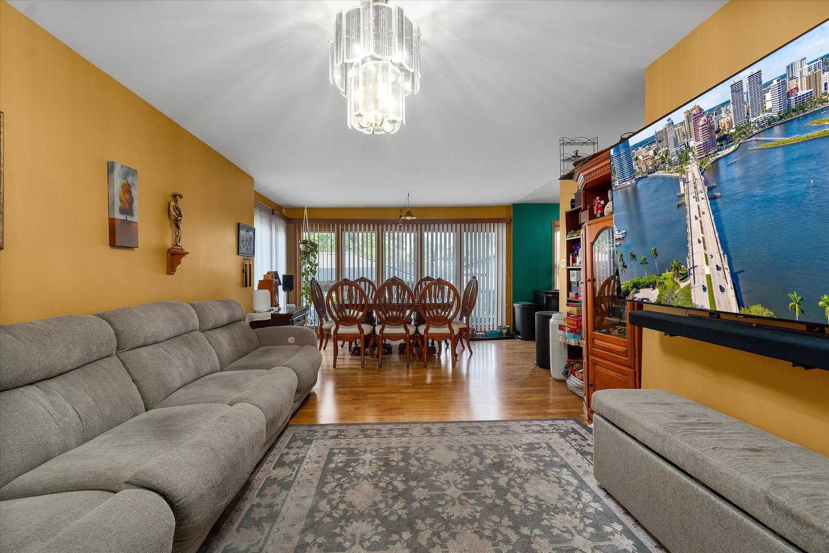719 North President Street Wheaton, IL 60187 - Photo 5 of 16 a living room with furniture and a dining table