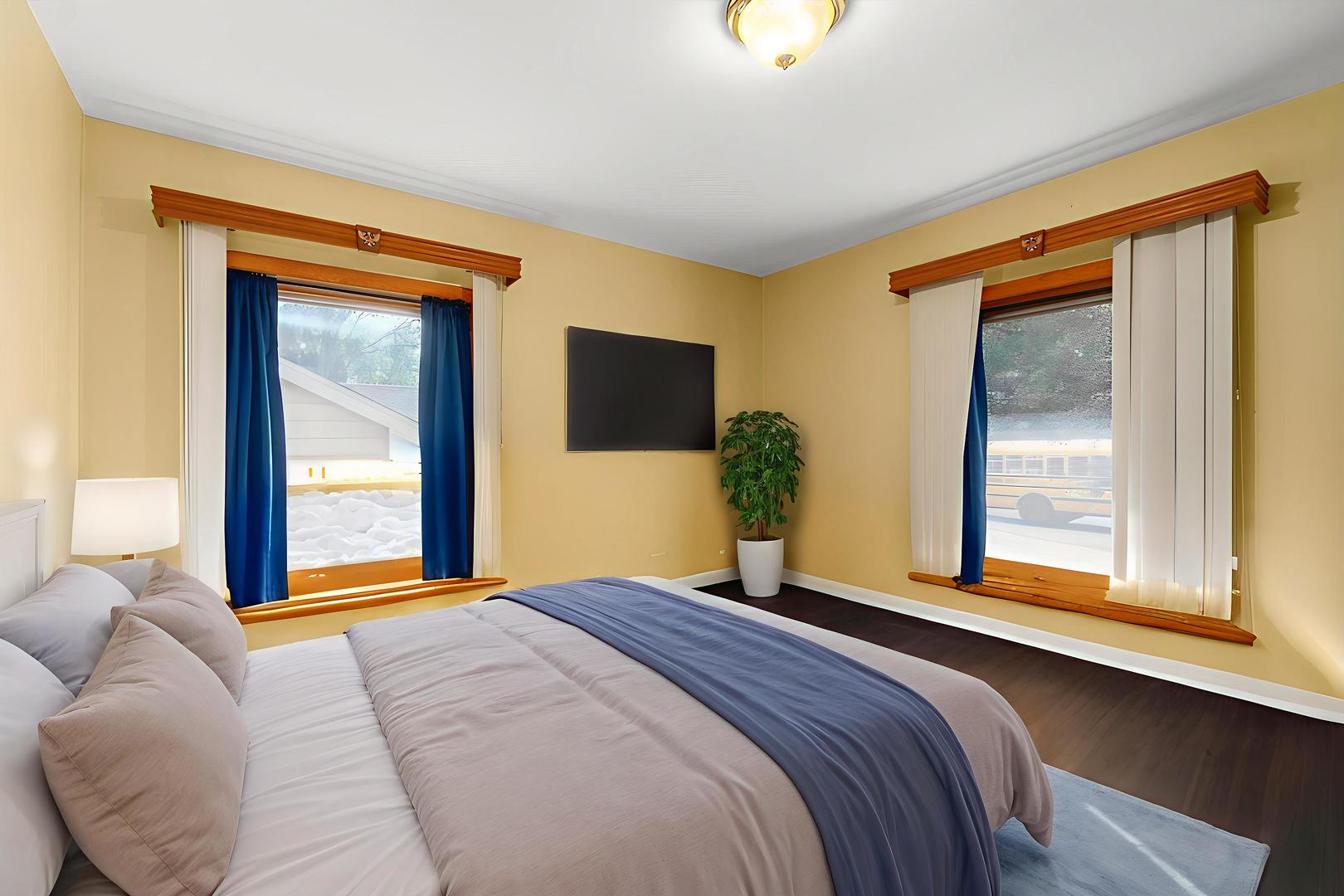 719 North President Street Wheaton, IL 60187 - Photo 6 of 16 a bedroom with a bed and a large window