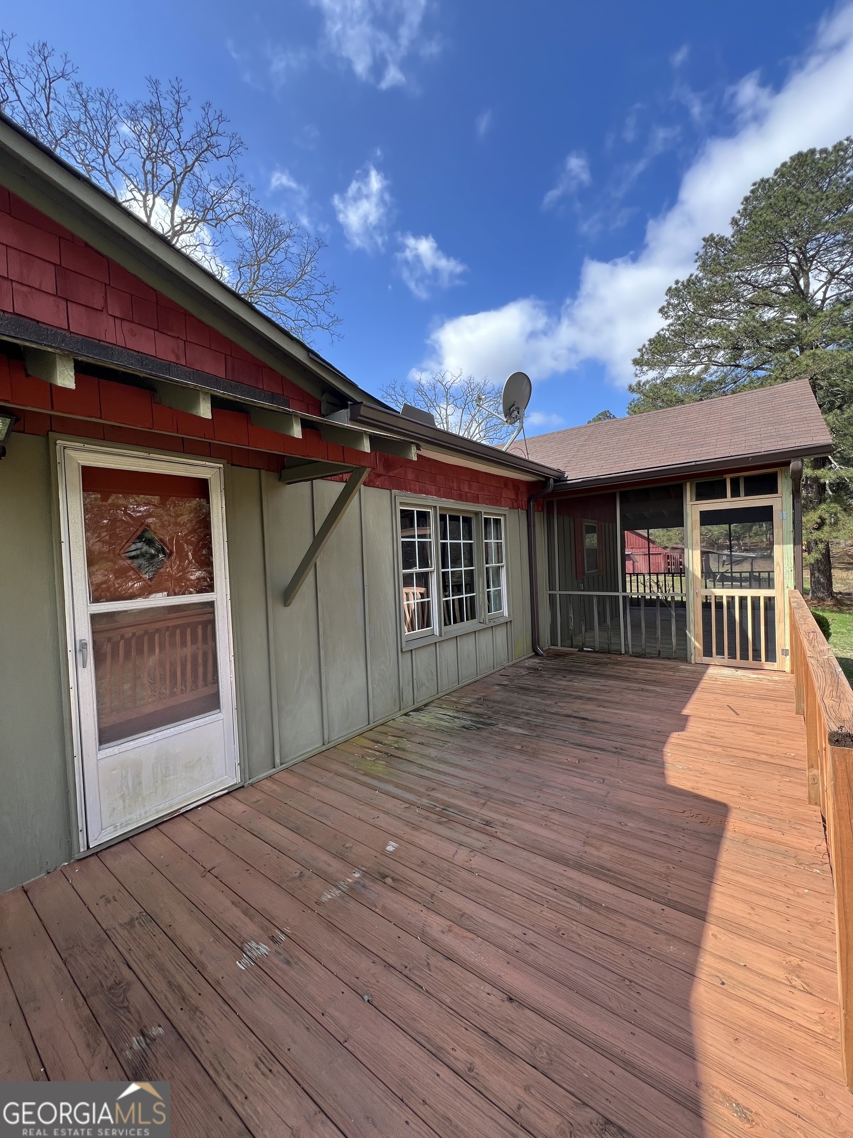 115 Old Stone Road Villa Rica, GA 30180 - Photo 18 of 18 a front view of house with deck and entertaining space