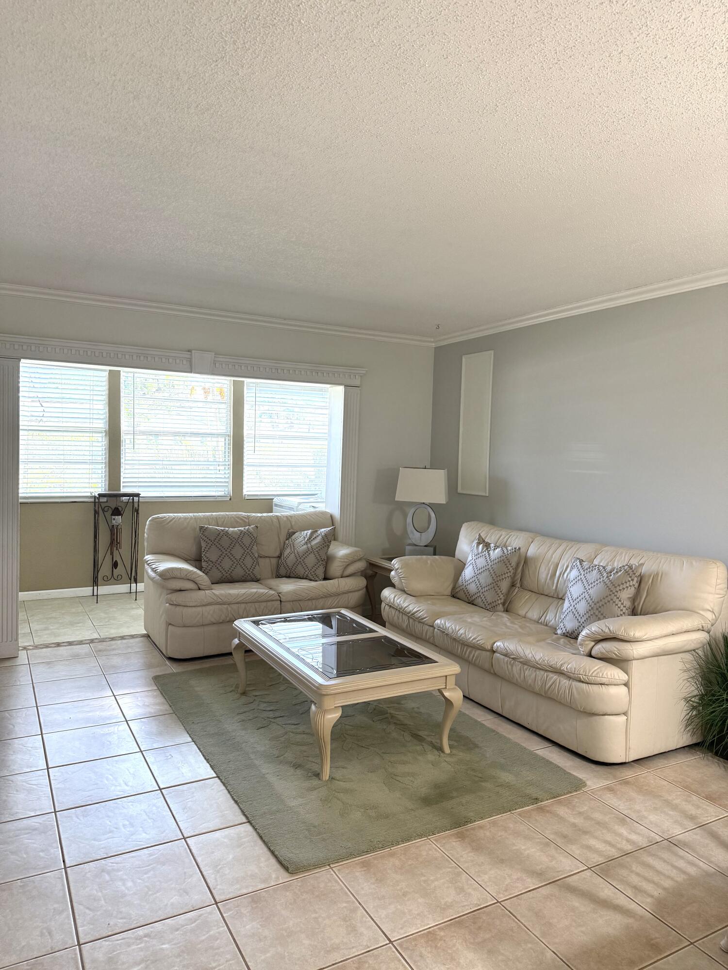 9272 Southwest 3rd Street, Unit 407 Boca Raton, FL 33428 - Photo 22 of 51 Living Room 2