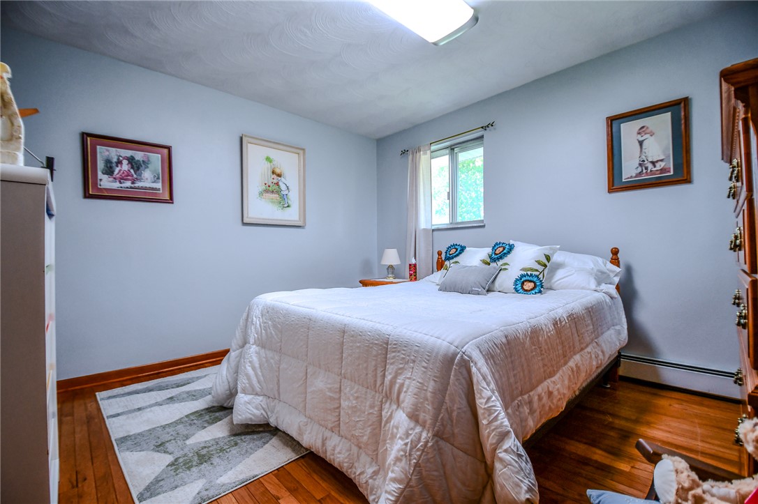 10833 Kendig Road Medway, OH 45341 - Photo 28 of 46 This cozy room features durable hardwood flooring and natural light.