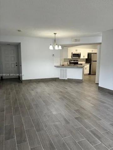 $234,000 | 8701 Wiles Road, Unit 103, Coral Springs, FL 33067