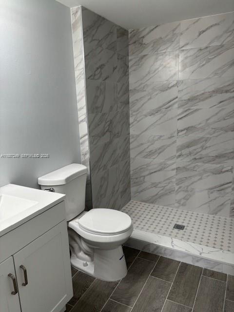 8701 Wiles Road, Unit 103 Coral Springs, FL 33067 - Photo 6 of 15 a bathroom with a toilet and a sink