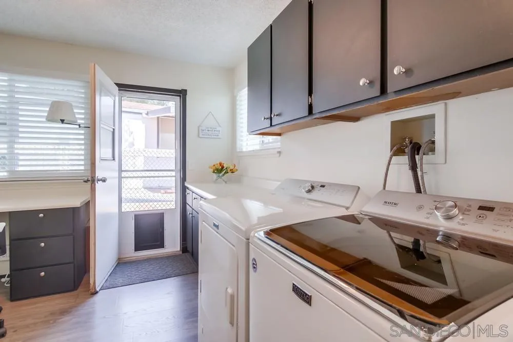 18218 Paradise Mountain Road, Unit 75 Valley Center, CA 92082 - Photo 41 of 68 a utility room with washer and dryer