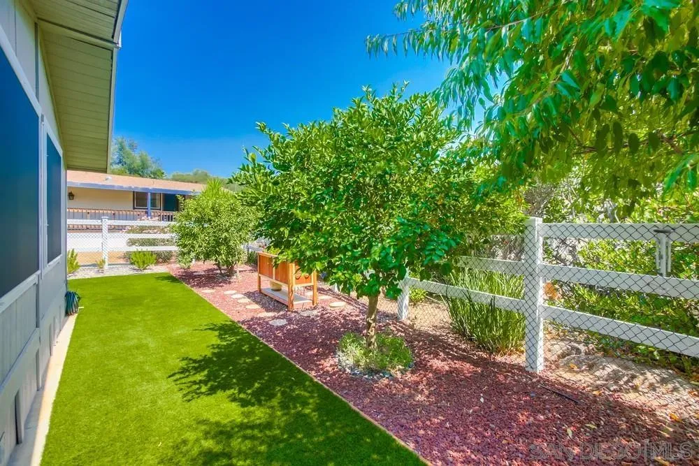 18218 Paradise Mountain Road, Unit 75 Valley Center, CA 92082 - Photo 49 of 68 a view of yard with green space