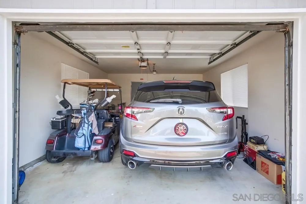 18218 Paradise Mountain Road, Unit 75 Valley Center, CA 92082 - Photo 55 of 68 a utility room with dryer and washer