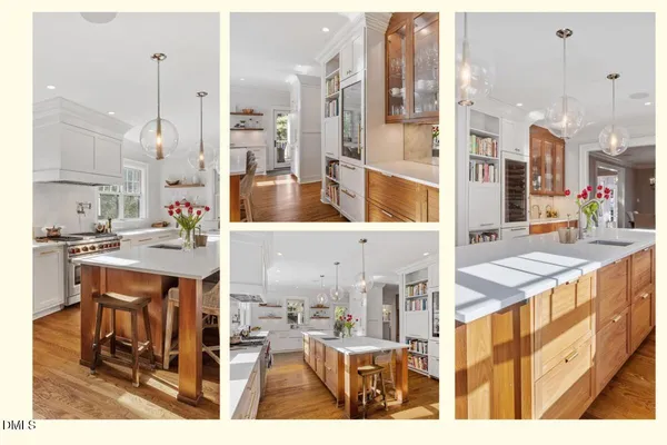 a kitchen with stainless steel appliances a stove a sink a oven a dining table and chairs