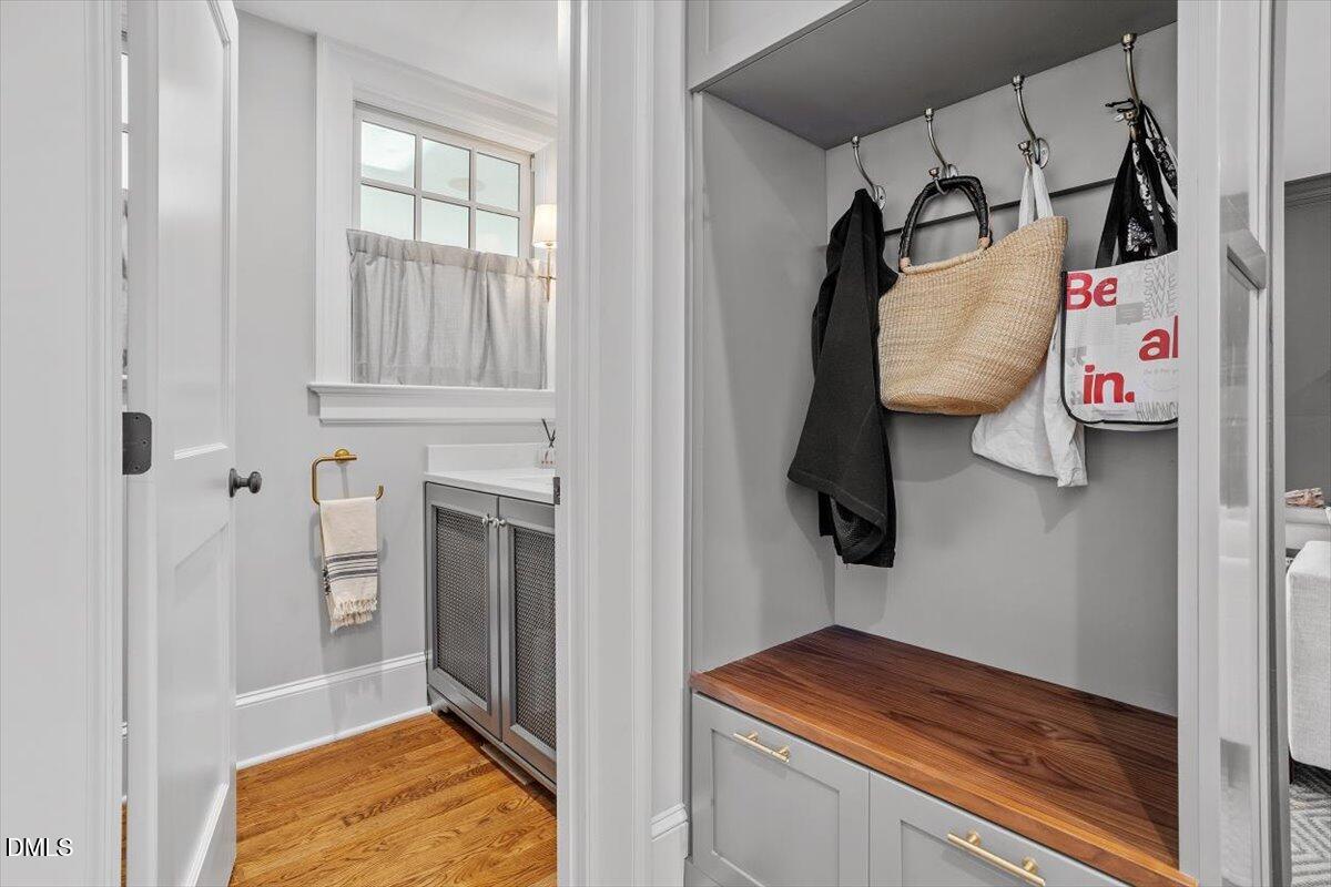 1015 Harvey Street Raleigh, NC 27608 - Photo 29 of 95 a utility room with closet dryer and washer