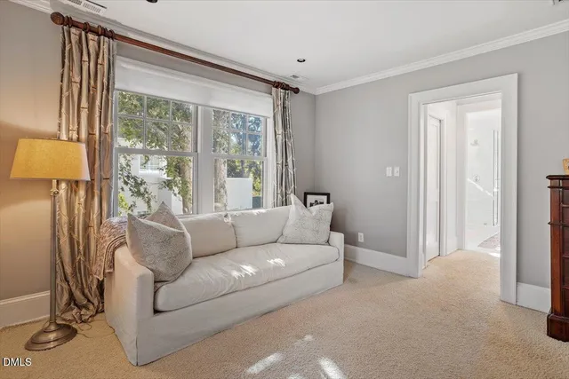 an aerial view of a house with yard and outdoor seating