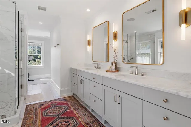 an aerial view of a houses with yard