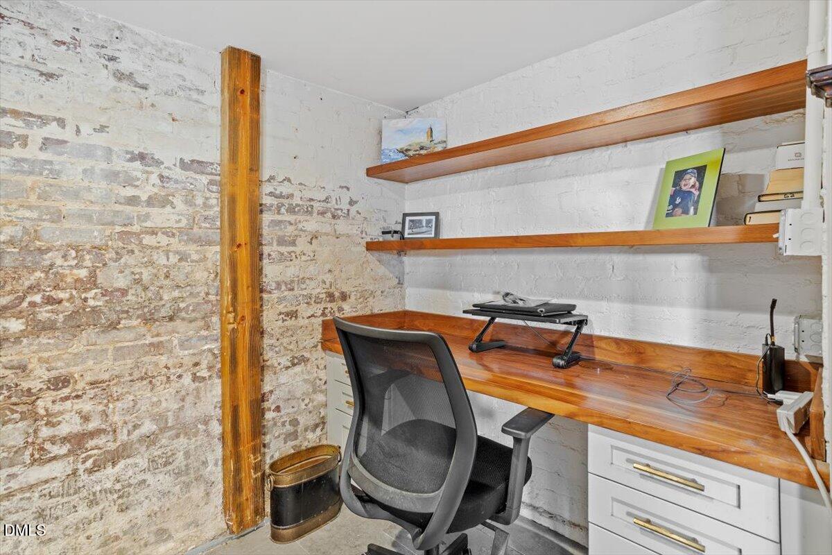 1015 Harvey Street Raleigh, NC 27608 - Photo 57 of 95 a room with a sink and a chair