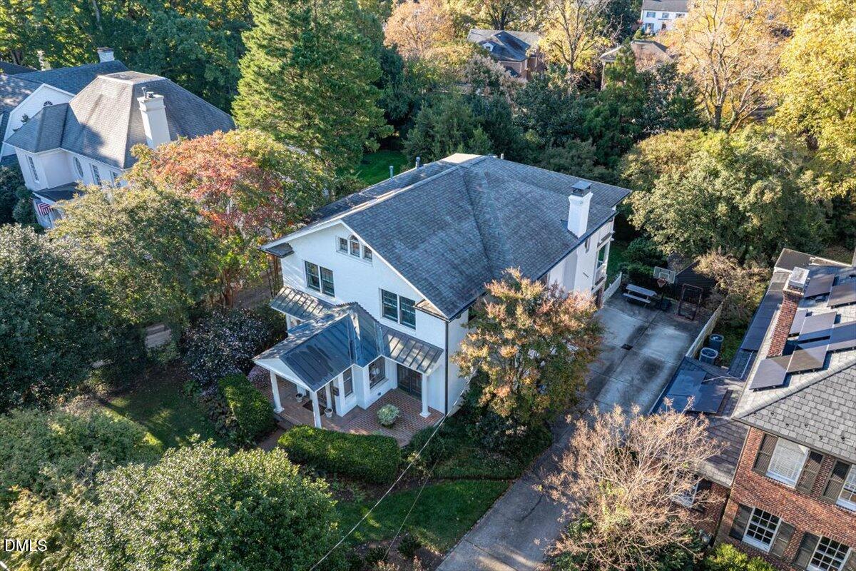 1015 Harvey Street Raleigh, NC 27608 - Photo 75 of 95 an aerial view of a house with yard and outdoor seating