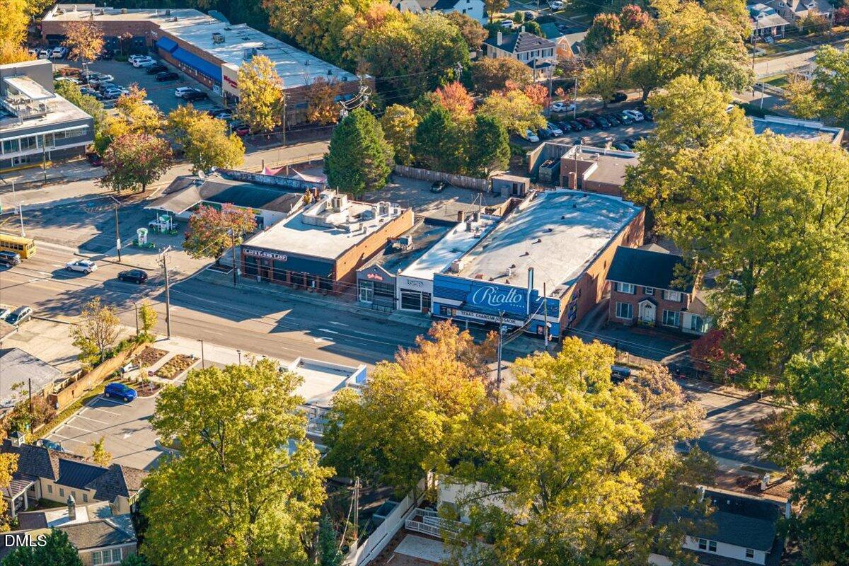 1015 Harvey Street Raleigh, NC 27608 - Photo 78 of 95 an aerial view of a houses with yard