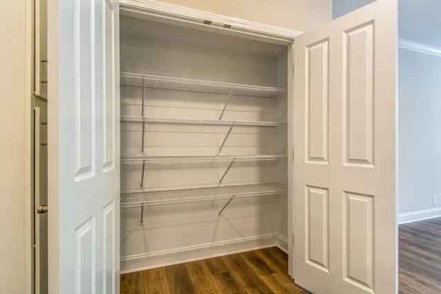 a empty closet with white paint