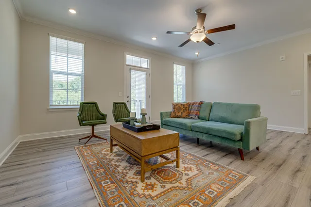 a living room with furniture and a window
