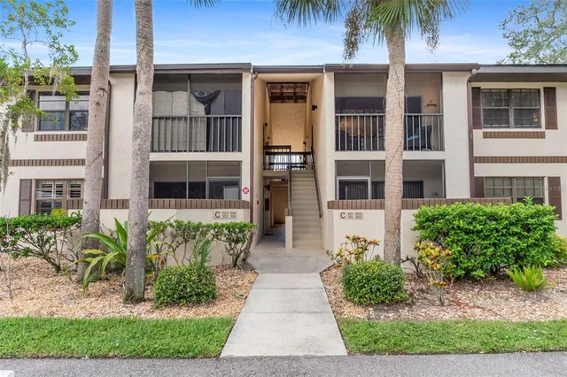 a front view of a multi story residential apartment building