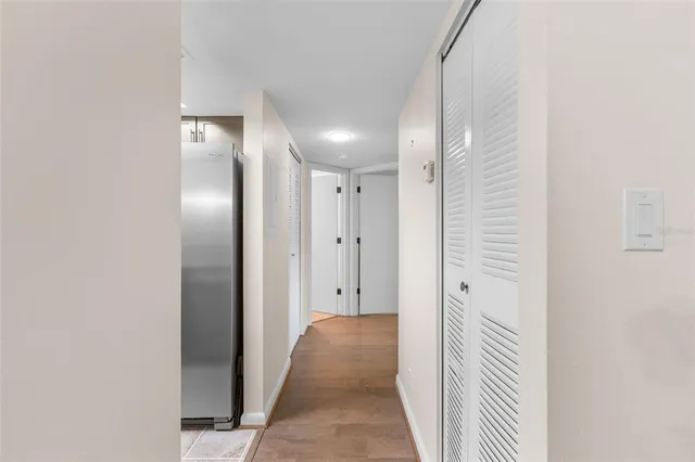 a view of a bedroom from a hallway