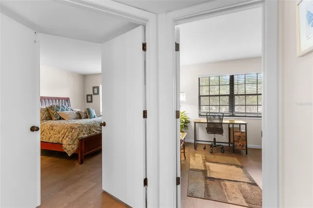 a view of a livingroom with furniture and a window