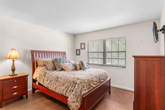 a view of a room with cabinet and mirror