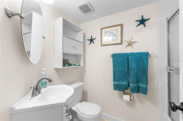 a view of a chairs and table in the balcony