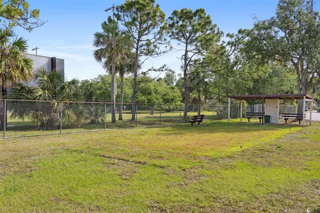 a view of house with outdoor seating