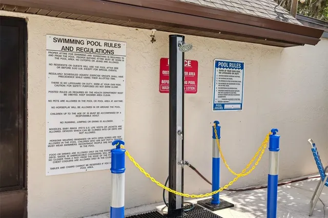 an outdoor space with lots of tables and chairs