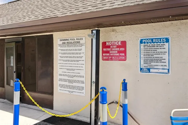 an outdoor space with lots of tables and chairs