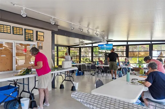 a front view of a house with a yard and a garage