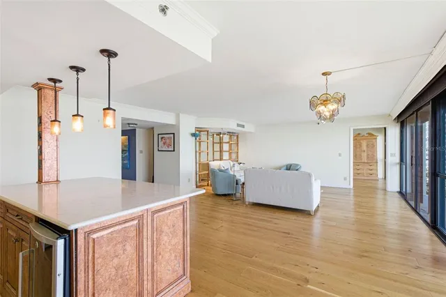 a spacious bathroom with a granite countertop sink mirror and vanity